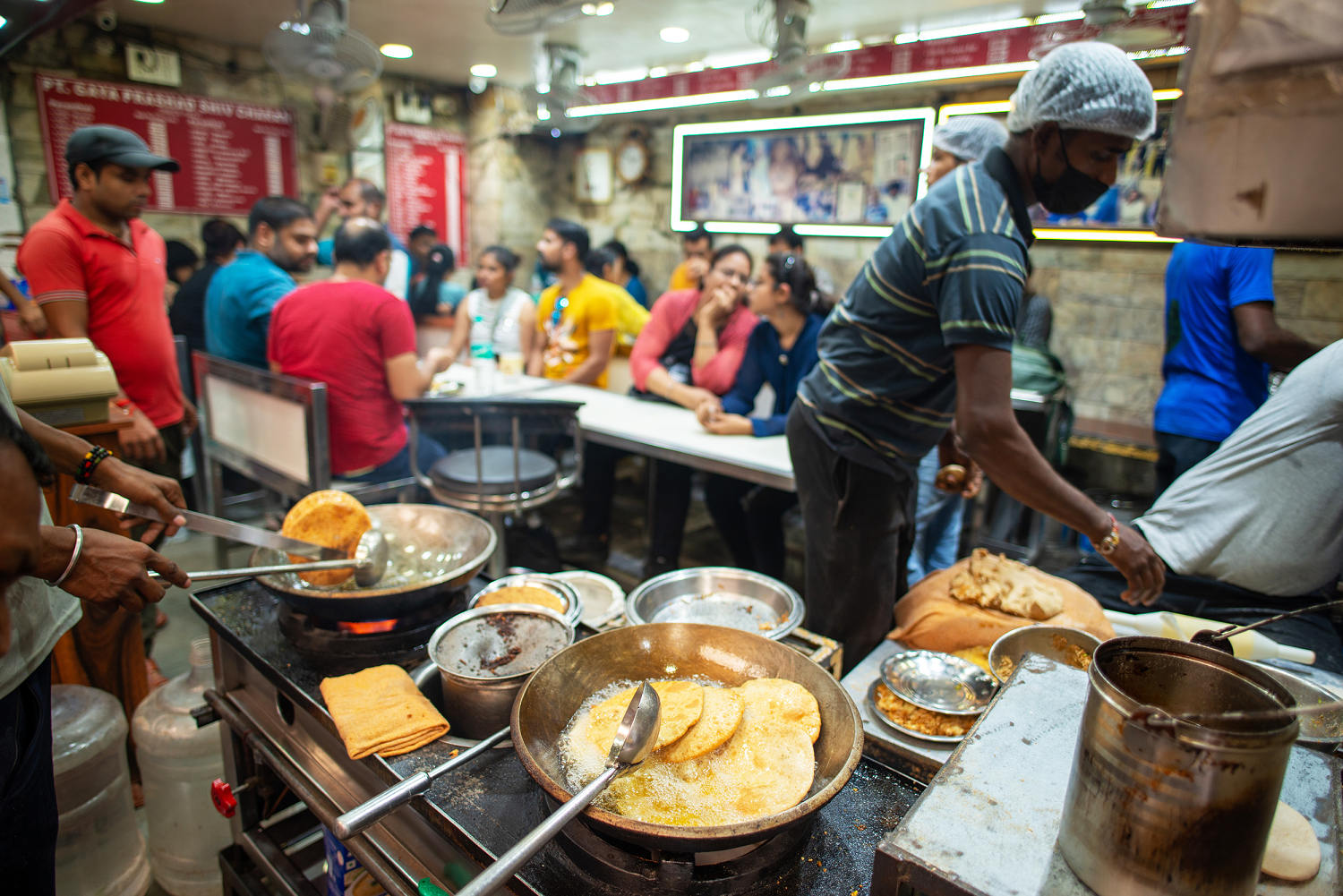 Indians line up for these flatbreads. But now gas is running short.