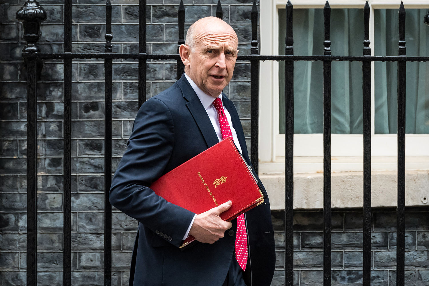 U.K. defense secretary resigns, saying the government isn’t willing to spend enough on the military