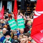 Thousands rally in Belfast to condemn anti immigrant rioting that followed stabbing